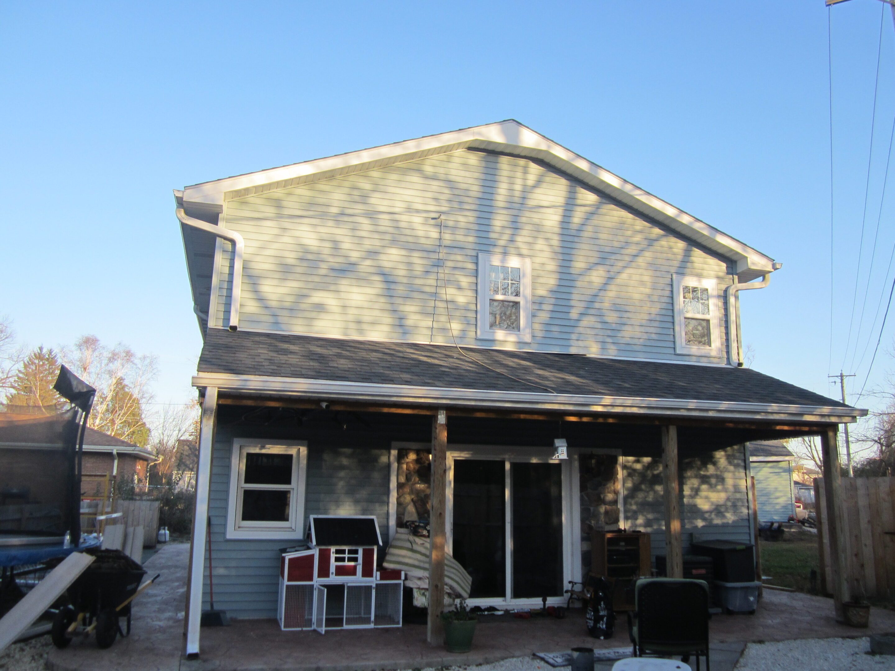 Residential home with wooden porch