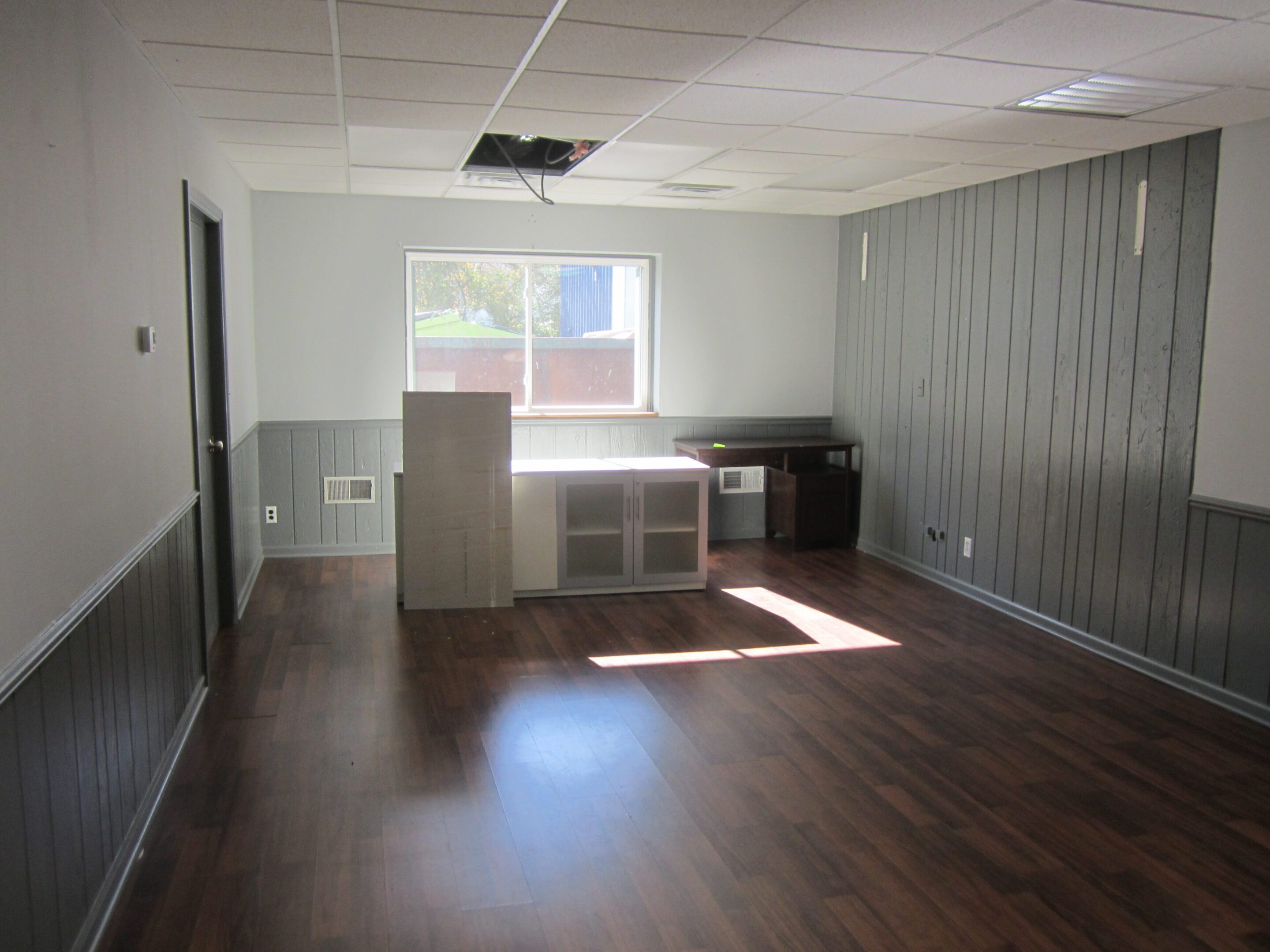 Sunlit room with ceiling tiles